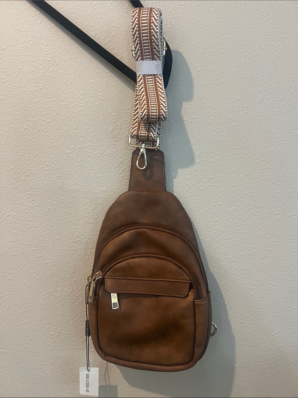 New with tags Aurora Beige Street Casual Trapeze Sling Bag